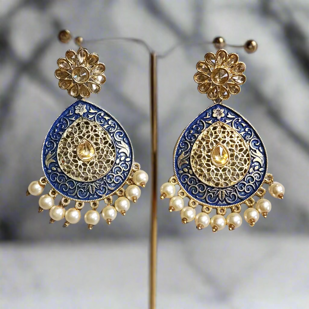Pair of gold and blue earrings with pearl accents